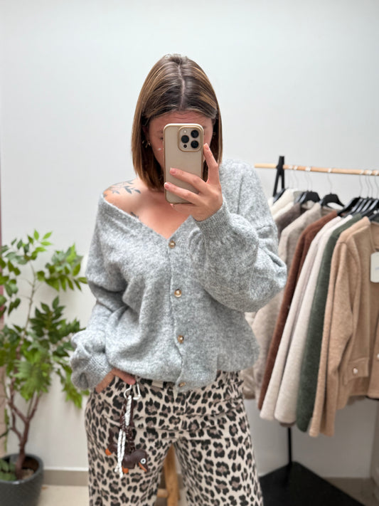 Gilet doux à bouton dorés